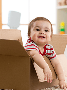 Photo of a child in a box illustrating ...