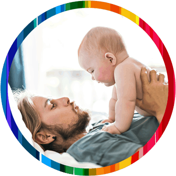 Photo of man and baby representing the types of families home visitors serve with an enhanced understanding of substance use disorder gained after completing the RISE home visitor training.