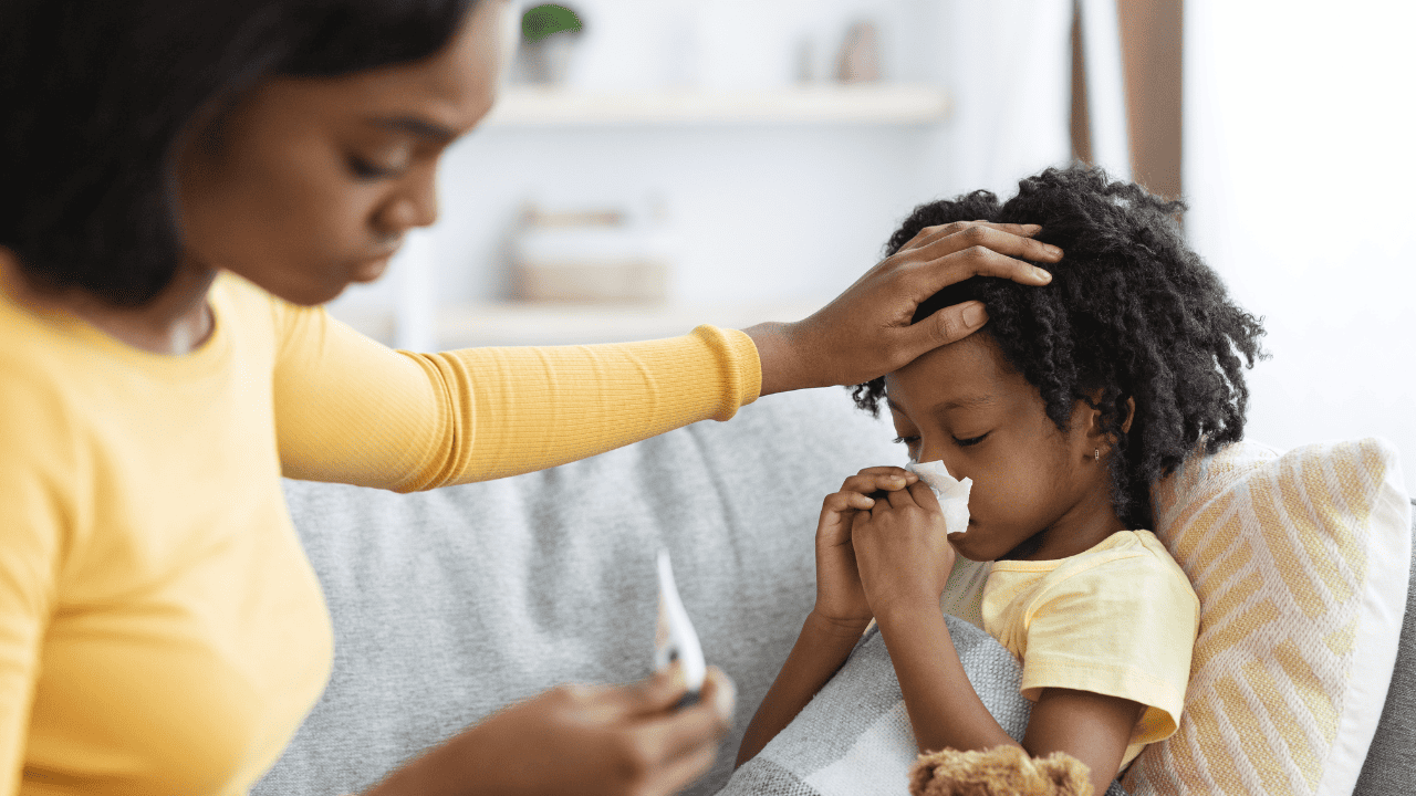 Sick kid being taken care of.