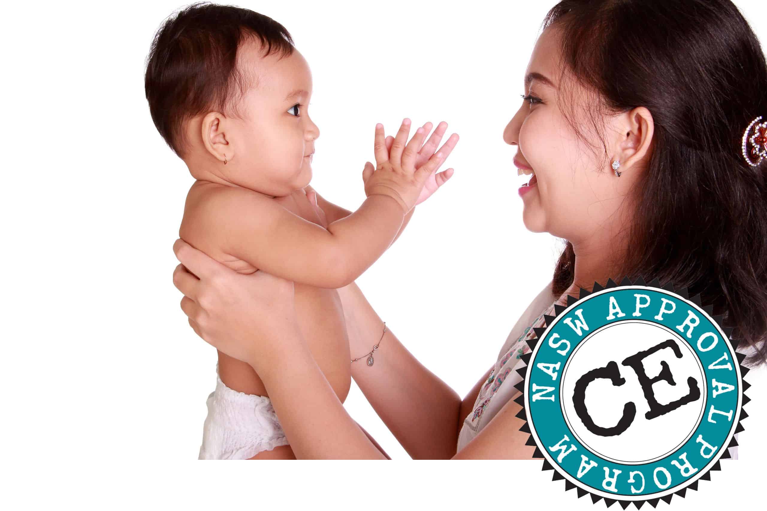 Photo of parent holding baby clapping hands for Great Kids observation framework webpage.